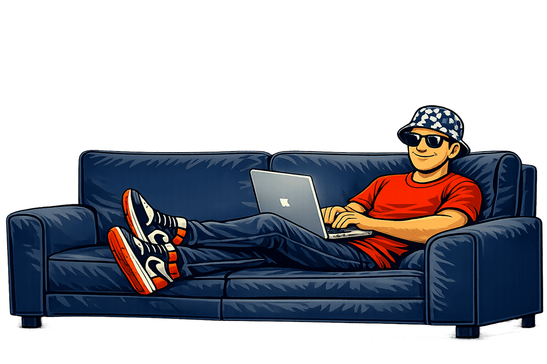 Dalton relaxing on a couch with his laptop